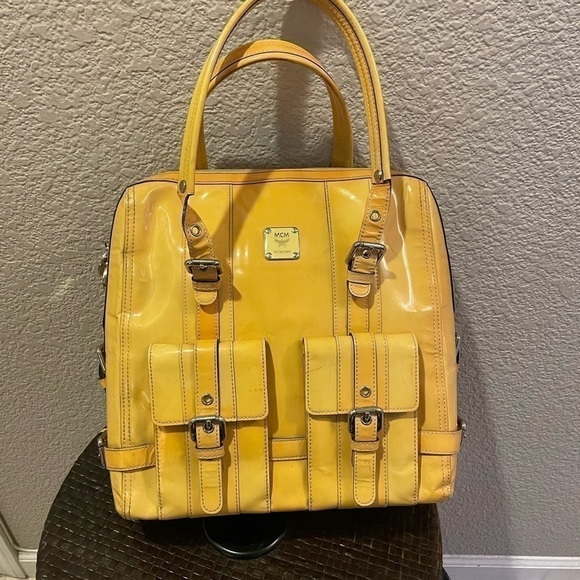 MCM Handbags - Authentic MCM Princess Lion Document Bag in Yellow Patent Leather